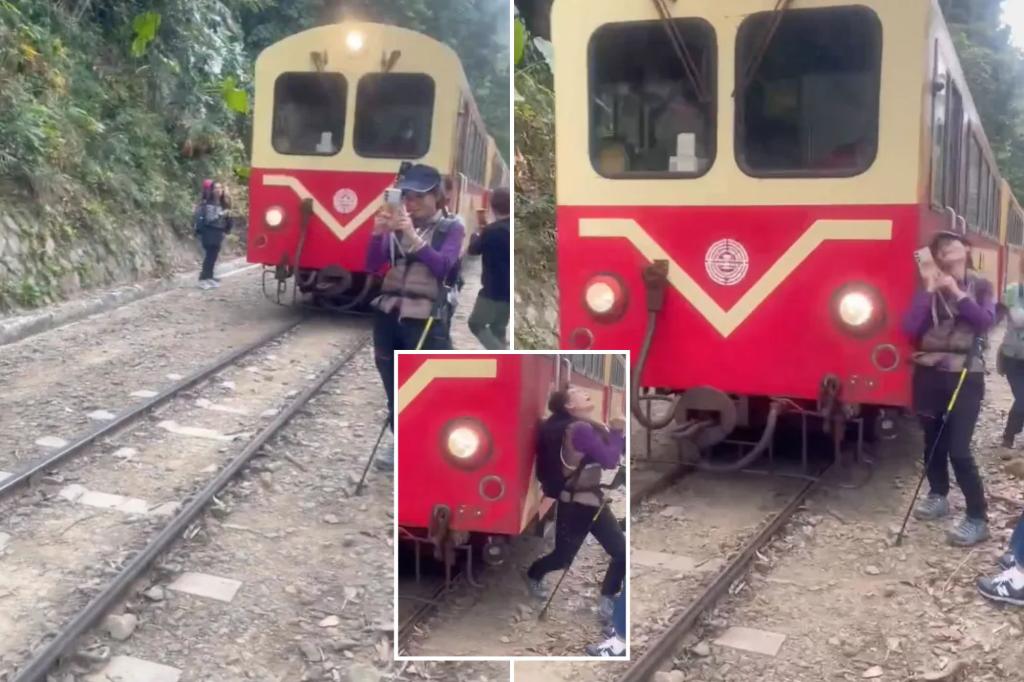 Tourist hit by train while taking selfie in horrifying moment